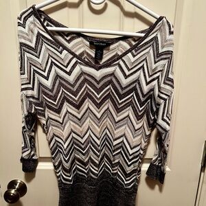 Great top for the holidays, with cool designs and sparkles, Never wore!